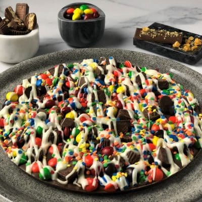 https://www.chocolatepizza.com/wp-content/uploads/2017/04/Chocolate-Pizza-Candy-Avalanche-45-marble-sharp-LR-400x400.jpg