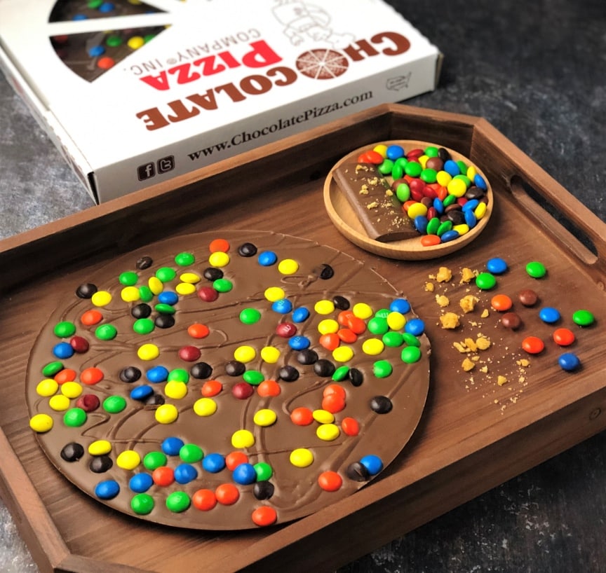 https://www.chocolatepizza.com/wp-content/uploads/2021/01/Chocolate-Pizza-Candy-Topped-tray-LR.jpg