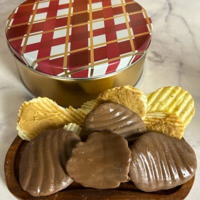 Peanut Butter Wings in a diamond pattern metal tin