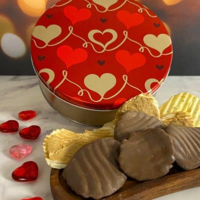 peanut butter wings in a red heart design tin